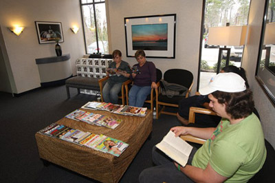 Our reception area includes a children's play area for the youngsters who accompany their parents or older brothers and sisters to their appointments. It also has a courtesy phone, up-to-date reading material, and comfortable seating with gentle, commercial-free music. We offer complimentary coffee, juice, and water for all patients and their families. Our reception area also offers Wi-Fi Internet service for parents that need to stay connected while here with their children. Our reception area is a refuge from the hectic pace of day-to-day life. 